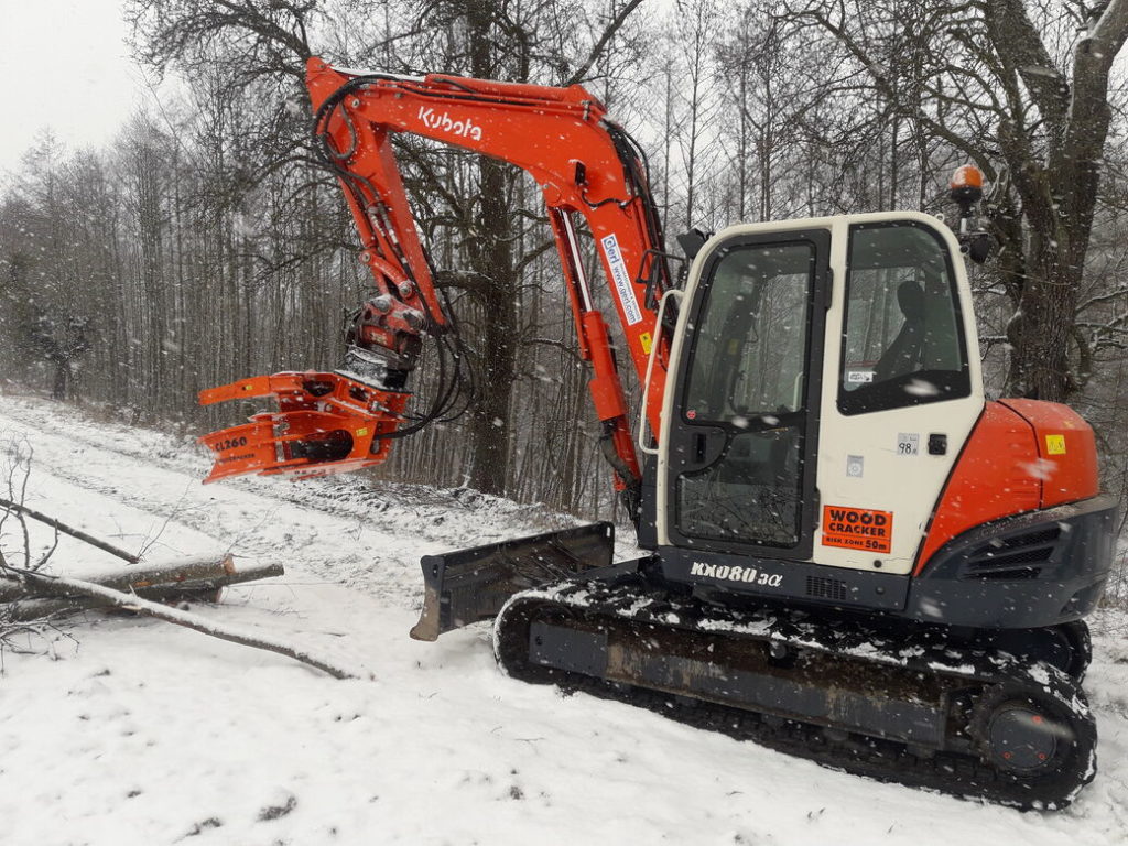 Bagger mit Holzfällgreifer